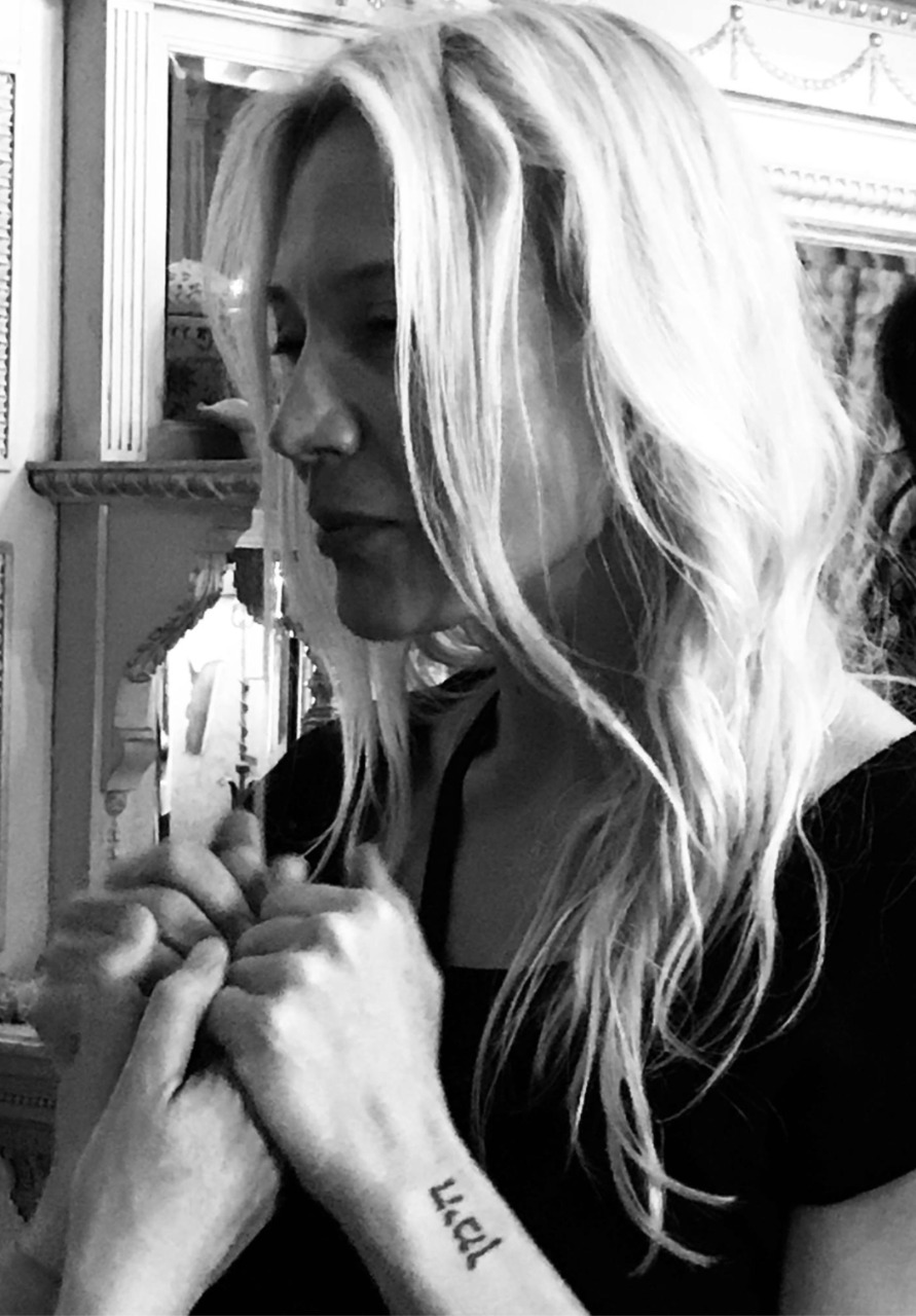 Black-and-white portrait of Dr Karien Earle in a contemplative moment